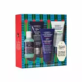 Caja de regalo de cuidado de la piel para hombre de Kiehl's para las fiestas, que incluye limpiador, crema de afeitar, hidratante y tratamiento calmante en un empaque festivo.