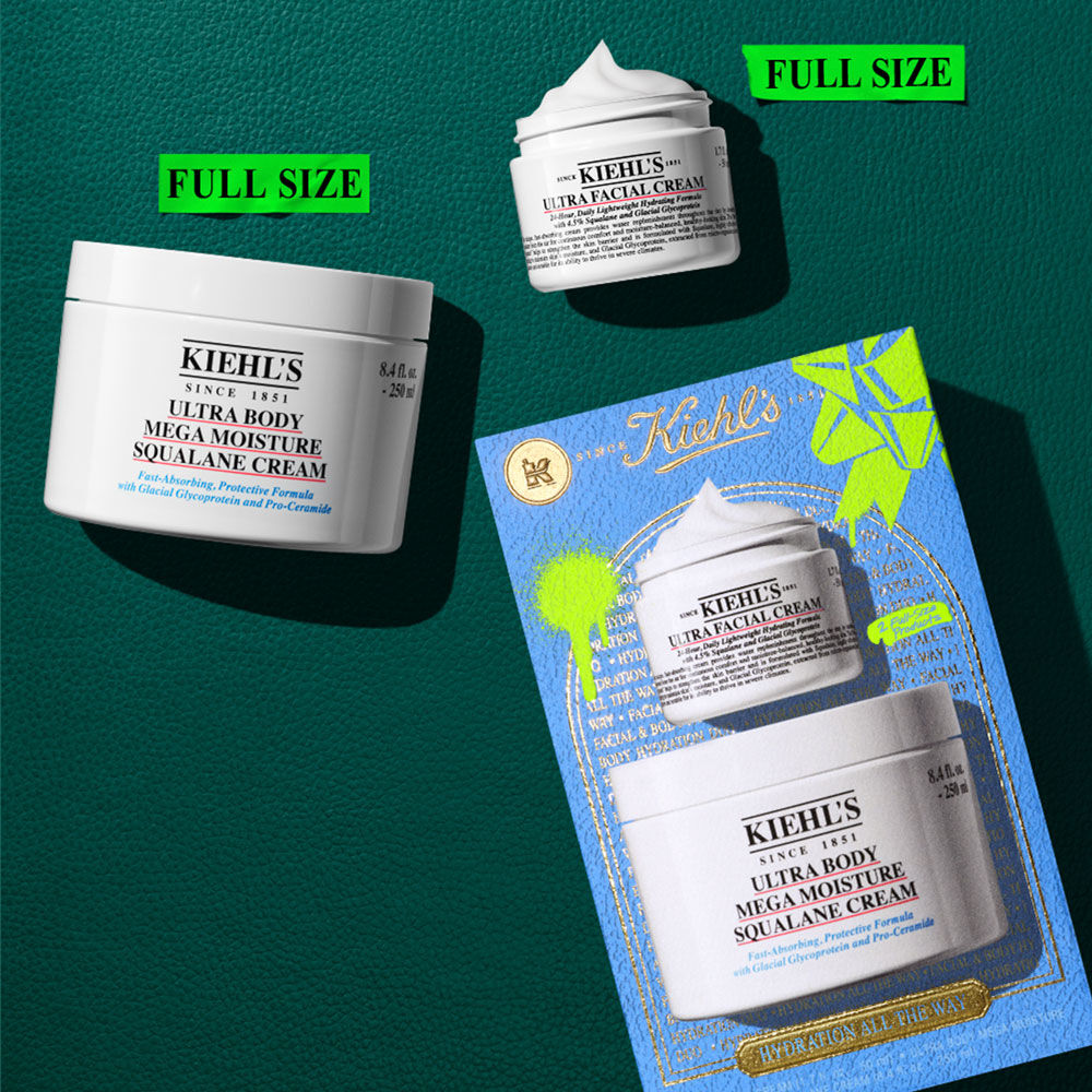 Un grafico muestra dos tarros blancos de crema Kiehl’s, apilados, proyectando sombra sobre fondo blanco. El tarro superior mas pequeno es "KIEHL’S ULTRA FACIAL CREAM" con un remolino visible de crema blanca. El tarro inferior mas grande es "KIEHL’S ULTRA BODY MEGA MOISTURE SQUALANE CREAM".