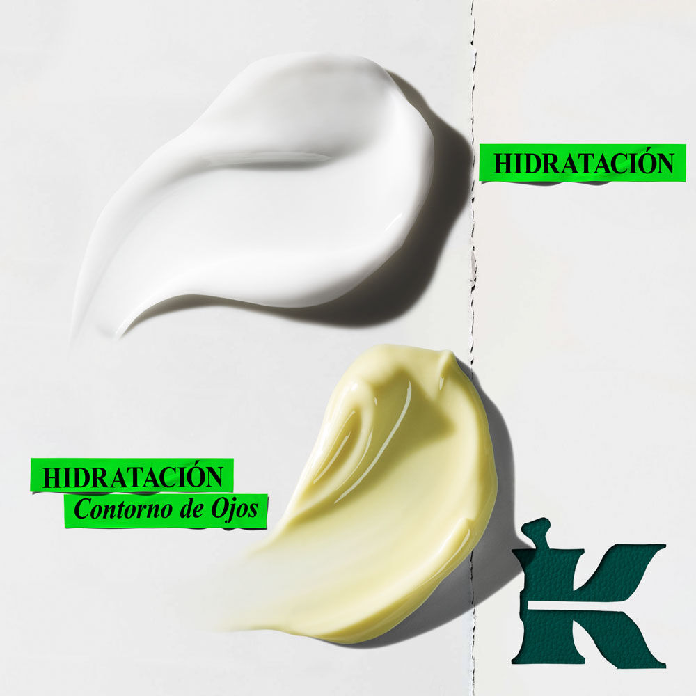 Grafico con dos muestras de crema sobre fondo blanco. La superior es blanca, con texto verde a la derecha: "Hidratante". La inferior es amarillo-verde, con texto verde a la izquierda: "Crema de Ojos Hidratante". Un gran logo "K" verde oscuro en la esquina inferior derecha.